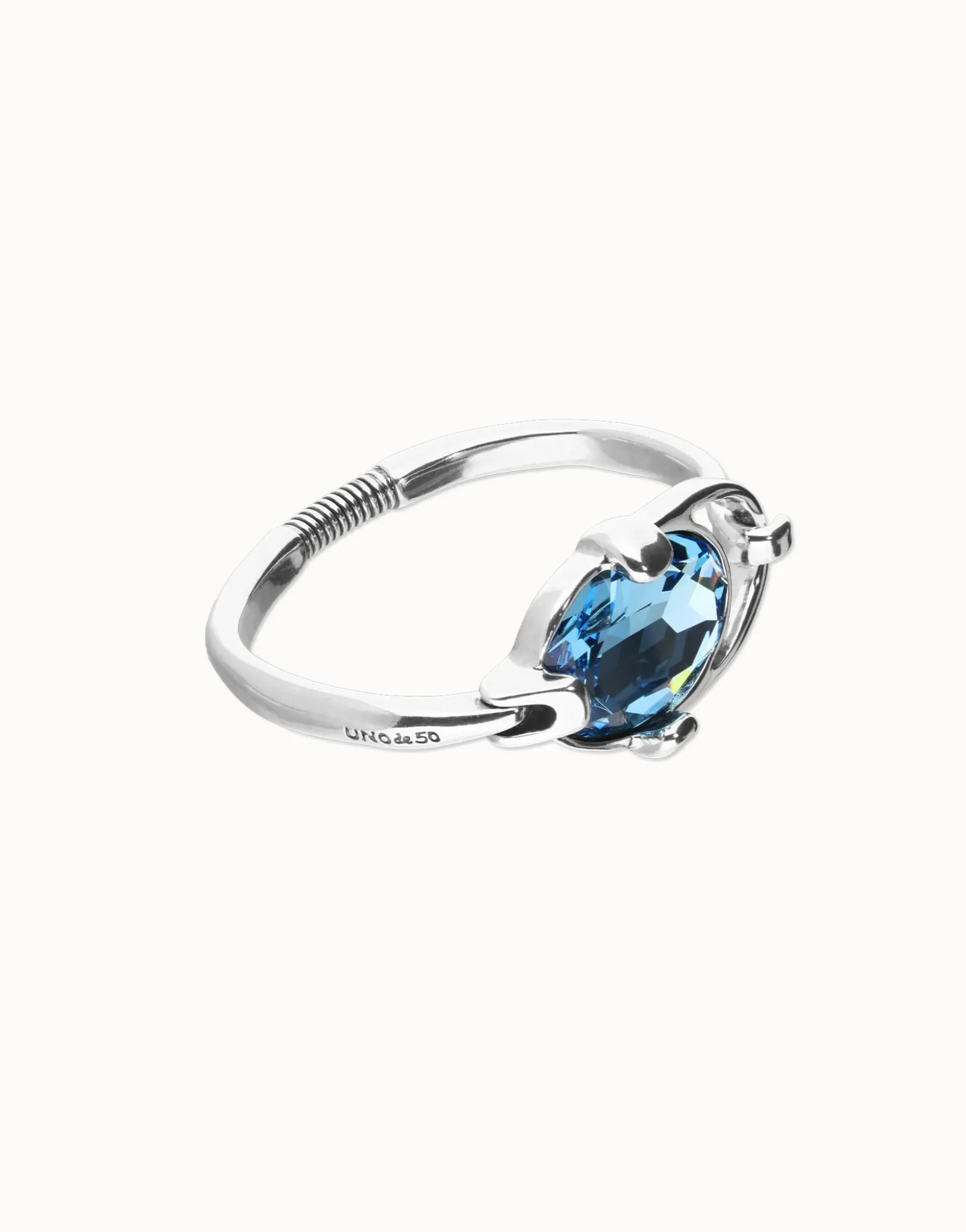 Pulsera rígida bañada en plata de ley con cristal facetado azul