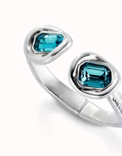 Pulsera rígida bañada en plata de ley y dos cristales celestes