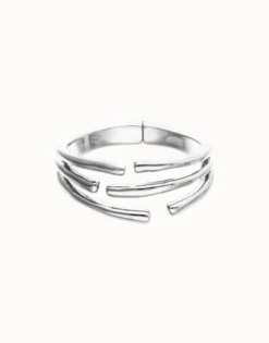 Pulsera rígida con múltiples formas orgánicas entrelazadas bañada en plata de ley