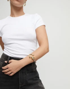 Pulsera rígida con tres bolas bañadas en oro 18k
