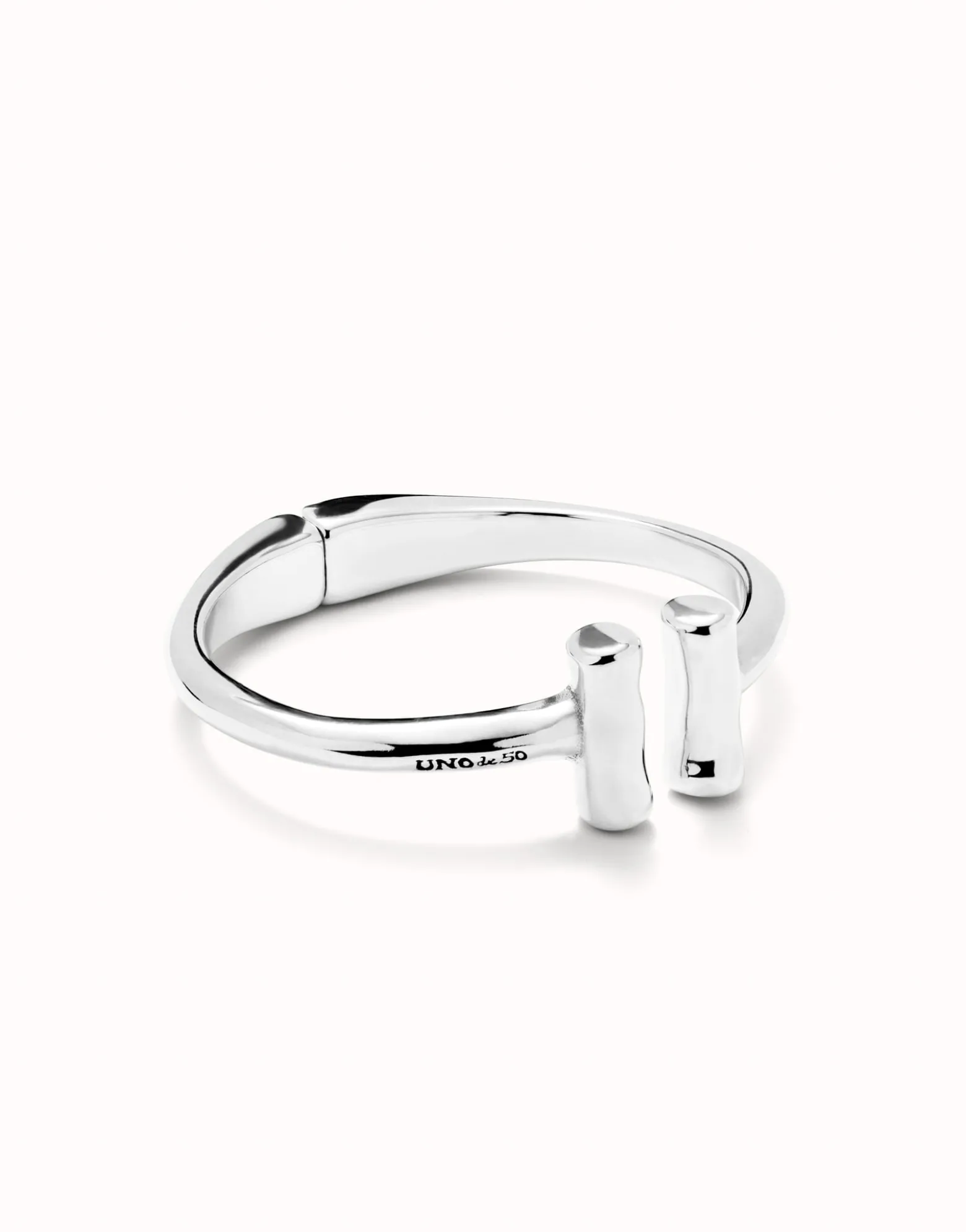Pulsera rigida bañada en plata de ley y dos tubos en sus extremos