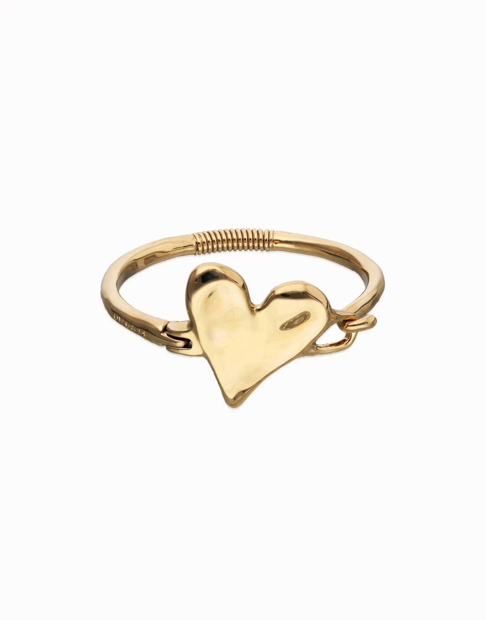 Pulsera semirrígida bañada en oro 18k y detalle de corazón