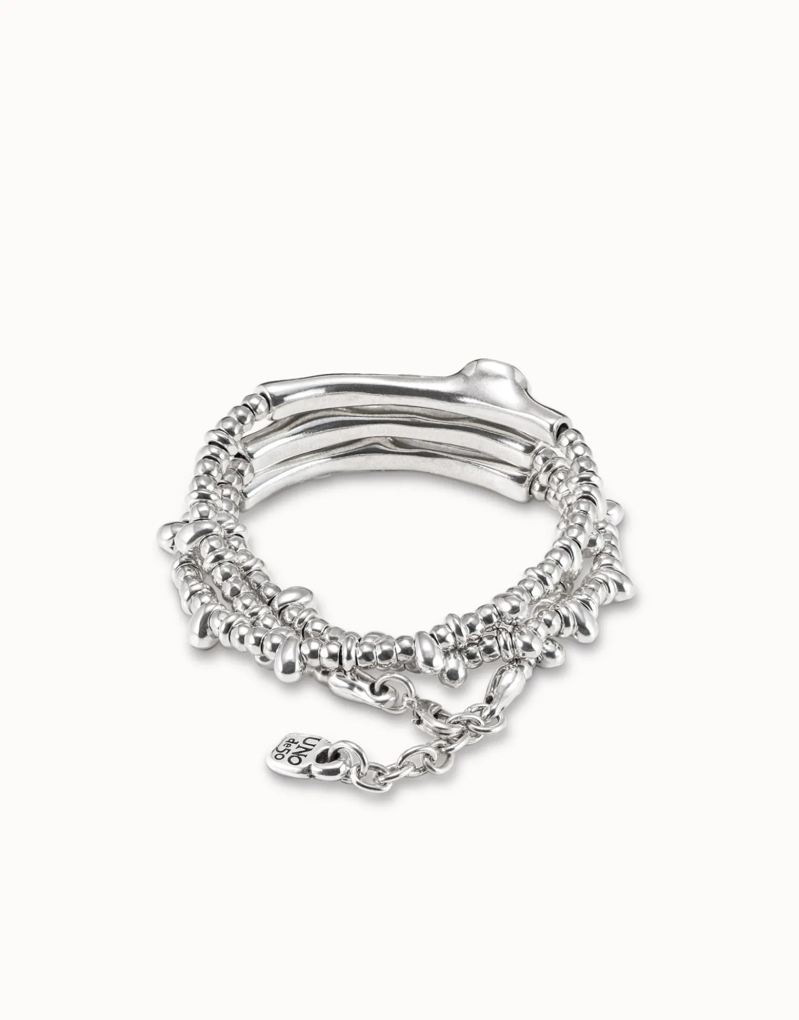 Pulsera triple bañada en plata de ley y cristal .