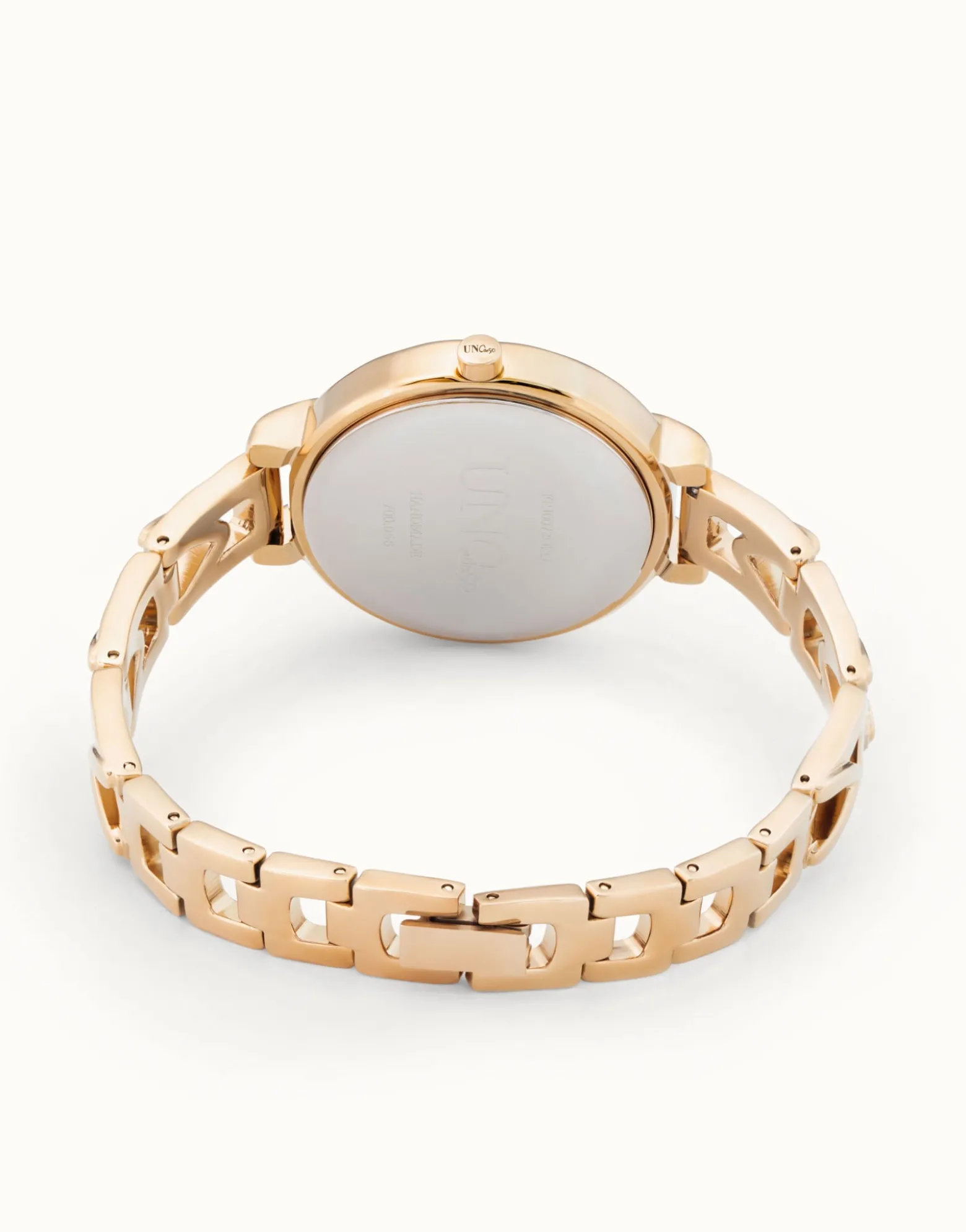 Reloj bañado en oro 18k con correa metálica y esfera redonda con interior blanco